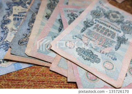 A pile of vintage Russian rubles banknotes A pile of vintage Russian rubles banknotes 135726170