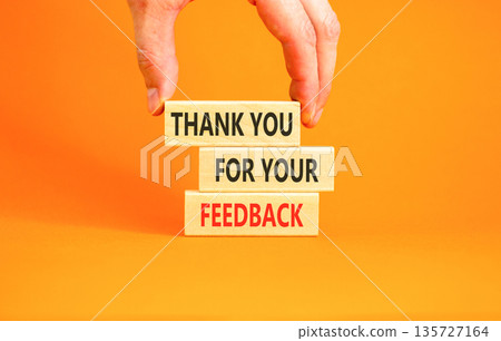 Thank you for your feedback symbol. Concept words Thank you for your feedback on beautiful wooden blocks. Beautiful orange background. Business thank you for your feedback concept. Copy space. Thank you for your feedback symbol. Concept words Thank you for your feedback on beautiful wooden blocks. Beautiful orange background. Business thank you for your feedback concept. Copy space. 135727164