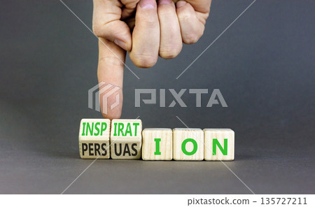 Persuasion or inspiration symbol. Concept words Persuasion and Inspiration on wooden cubes. Beautiful grey background. Psychologist hand. Psychology persuasion inspiration concept. Copy space. Persuasion or inspiration symbol. Concept words Persuasion and Inspiration on wooden cubes. Beautiful grey background. Psychologist hand. Psychology persuasion inspiration concept. Copy space. 135727211
