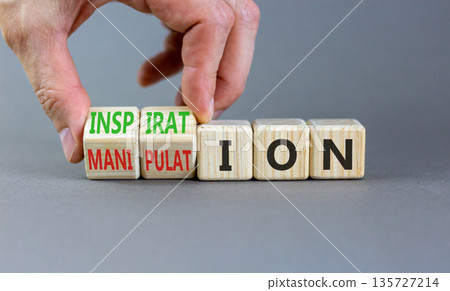 Inspiration or manipulation symbol. Concept words Inspiration and Manipulation on wooden cubes. Beautiful grey background. Psychologist hand. Psychology inspiration manipulation concept. Copy space. 135727214