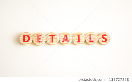 Details detail symbol. Concept word Details on beautiful wooden circles. Beautiful white background. Business details concept. Copy space. Details detail symbol. Concept word Details on beautiful wooden circles. Beautiful white background. Business details concept. Copy space. 135727238