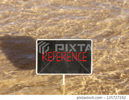 References or reference symbol. Concept word Reference on beautiful black blackboard. Beautiful Red sea water background. Business references or reference concept. Copy space. References or reference symbol. Concept word Reference on beautiful black blackboard. Beautiful Red sea water background. Business references or reference concept. Copy space. 135727282