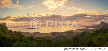 Panorama of Mauritius beach with indian ocean and dramatic sky at sunset 135727514