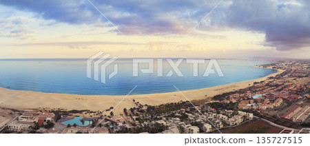 Panorama of Chaves beach with blue ocean luxury resort and sandy beach at sunset 135727515
