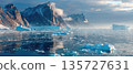 Massive Iceberg in Arctic Ocean with Snowy Peaks 135727631