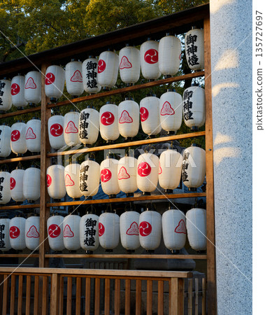 Lanterns illuminated by the setting sun Lanterns illuminated by the setting sun 135727697