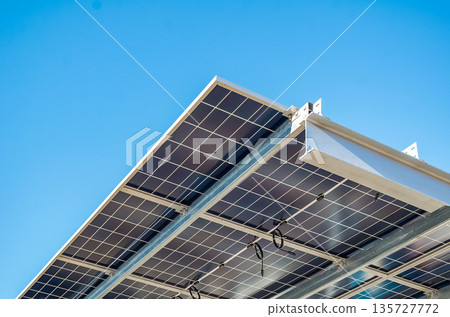 Solar panel installation in outdoor parking lot Solar panel installation in outdoor parking lot 135727772