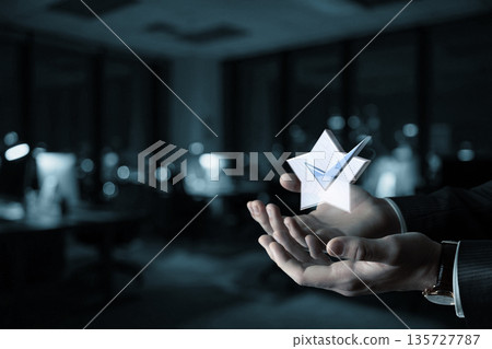 Glowing checkmark hands. 135727787