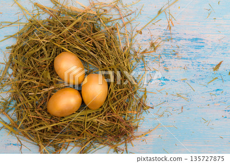 Golden Easter eggs. 135727875