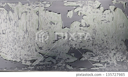 A weathered wall with peeling flaky film or paint or metallic coating, beautiful sunny old layered detailed texture, aged background with flaking coatings A weathered wall with peeling flaky film or paint or metallic coating, beautiful sunny old layered detailed texture, aged background with flaking coatings 135727985