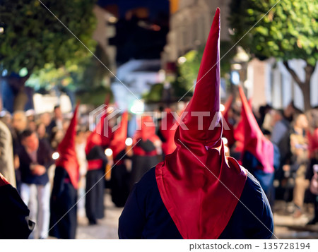 Back view of a nazareno in a holy week procession 135728194