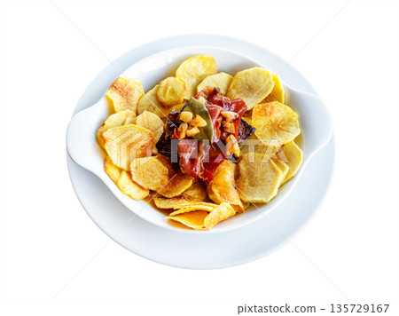 Delicious plate of bife a portuguesa served with crispy potato chips and garnished with flavorful ingredients, showcasing a traditional culinary delight Delicious plate of bife a portuguesa served with crispy potato chips and garnished with flavorful ingredients, showcasing a traditional culinary delight 135729167