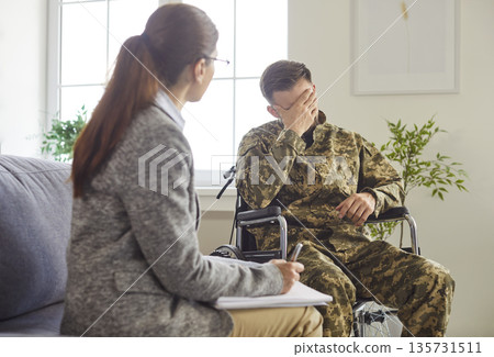Support therapy from psychologist for soldier in wheelchair, veteran suffering from depression Support therapy from psychologist for soldier in wheelchair, veteran suffering from depression 135731511