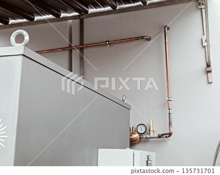 Industrial nitrogen gas piping system with pressure gauges and copper pipes Industrial nitrogen gas piping system with pressure gauges and copper pipes 135731701