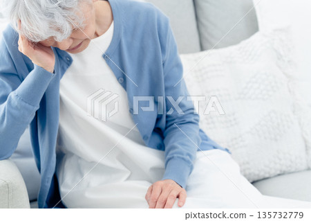 Senior woman with a headache Senior woman with a headache 135732779