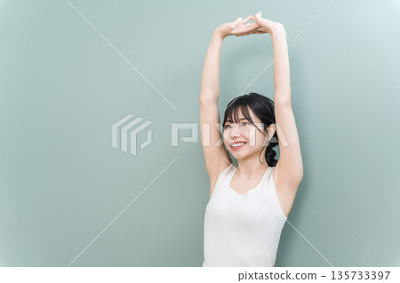 Smiling Asian woman in sleeveless clothes for beauty, skin care, hair removal and esthetics images Smiling Asian woman in sleeveless clothes for beauty, skin care, hair removal and esthetics images 135733397