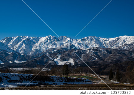 Winter scenery: Snow-capped Northern Alps, Hakuba Village, Nagano Prefecture Winter scenery: Snow-capped Northern Alps, Hakuba Village, Nagano Prefecture 135733883