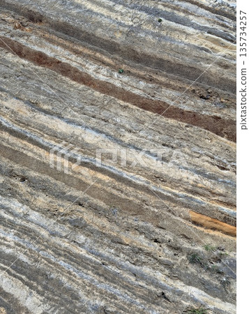 Cross section of folded strata exposed along a road on Izu Oshima Island Cross section of folded strata exposed along a road on Izu Oshima Island 135734257