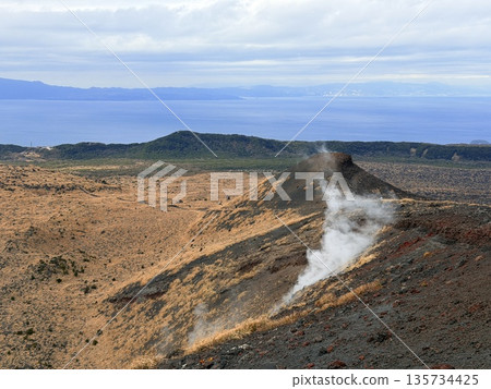 A view of the crater with steam seen while trekking on Mount Mihara, Izu Oshima 135734425