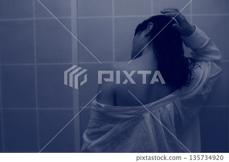 A woman thinking in the light A woman thinking in the light 135734920