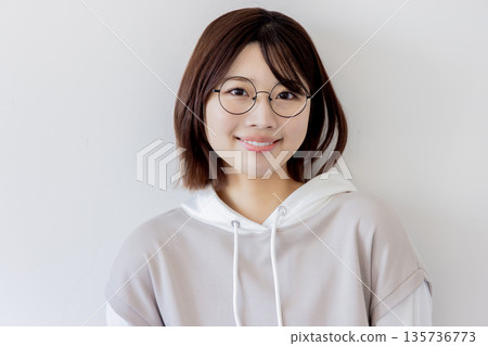 College student wearing glasses 135736773