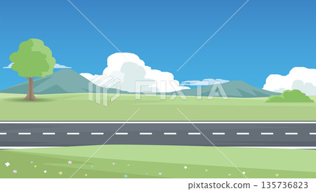 Simple natural landscape with an asphalt road winding through green meadows. Flowers bloom on the hillsides. Solitary towering tree stands tall. Mountains bloom beneath a azure sky and clouds. 135736823