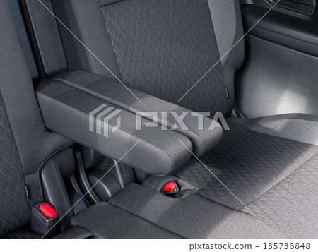 Center armrest in the rear seat of a passenger car 135736848