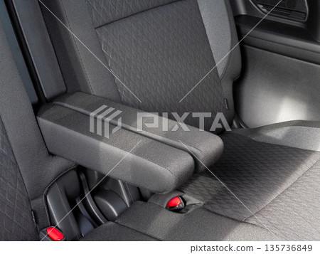 Center armrest in the rear seat of a passenger car 135736849