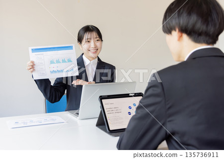 Business people having a meeting in a conference room Business people having a meeting in a conference room 135736911