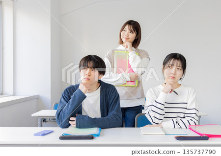 Worried student in the classroom Worried student in the classroom 135737790