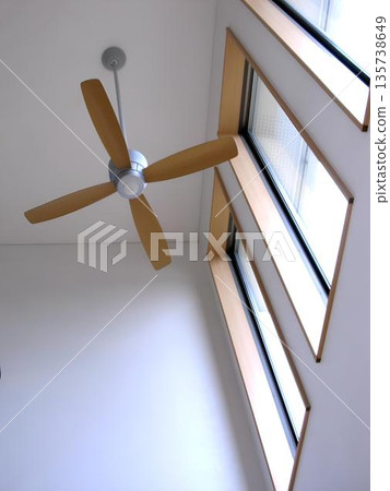 Ceiling fan in open ceiling space Ceiling fan in open ceiling space 135738649