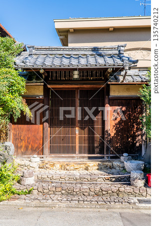 Michiyoshike Residence, a residential building from the early Showa period, with a lattice-door front gate, a tangible cultural property, located in Nishionocho, Oyama, Kita Ward, Kyoto City. Michiyoshike Residence, a residential building from the early Showa period, with a lattice-door front gate, a tangible cultural property, located in Nishionocho, Oyama, Kita Ward, Kyoto City. 135740212