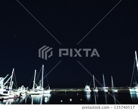 Starry sky seen from the harbor 135740517