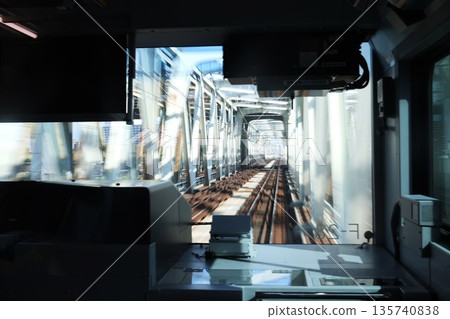 View from the driver's seat of a moving train View from the driver's seat of a moving train 135740838