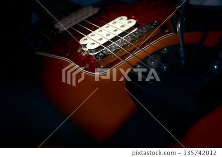 Rock and jazz! A well-used electric guitar 135742012