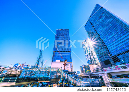 Tokyo cityscape, Japan, January 23rd. Plans for new facilities above the west exit of Shibuya Station... Mount Fuji on the left, Roppongi in the background on the right... A ray of hope for a new era 135742653