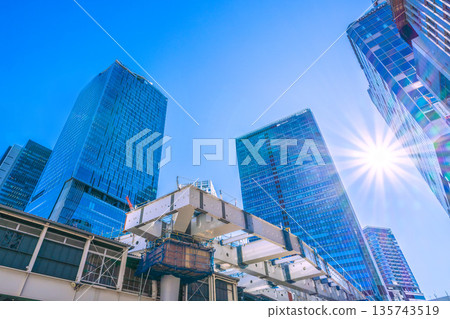 Tokyo cityscape, Japan, January 23rd. Steel beams and sunlight covering the Fukuras deck... A ray of hope for a new era = Shibuya 135743519