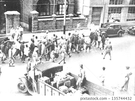 Old photo, 1937, Shanghai during the Sino-Japanese War, showing a captured Chinese soldier in guerrilla uniform Old photo, 1937, Shanghai during the Sino-Japanese War, showing a captured Chinese soldier in guerrilla uniform 135744432