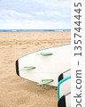 The sea, the surfboard, and the sand 135744445
