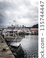 Resting and fishing boats at Naksan Port 135744447