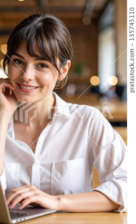 A woman working in a cafe 135745110