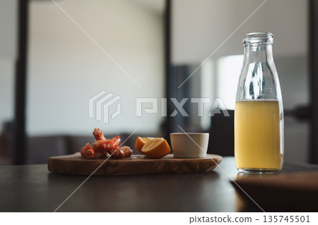 Crab legs with lemon and dressing on olive woob board 135745501