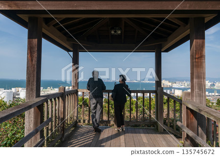 Japanese couple view Fukuoka view at Hakata port from Nishi park Japanese couple view Fukuoka view at Hakata port from Nishi park 135745672