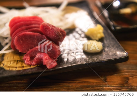 Horsetail meat raw sashimi in Japanese restaurant Horsetail meat raw sashimi in Japanese restaurant 135745706
