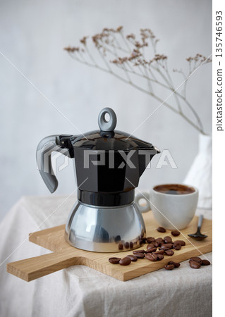 Mocha coffee pot and cup of espresso Mocha coffee pot and cup of espresso 135746593