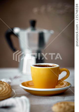 yellow coffee cup and Mocha coffee pot yellow coffee cup and Mocha coffee pot 135746594