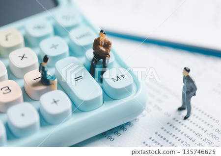 Miniature business people on pastel calculator and financial statement, symbolizing accounting teamwork, budgeting, tax planning, audit review and corporate finance decision making. 135746625