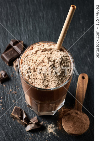 protein powder in scoop. dry mixture for preparation of sporting or dietary drink. protein powder in scoop. dry mixture for preparation of sporting or dietary drink. 135746662