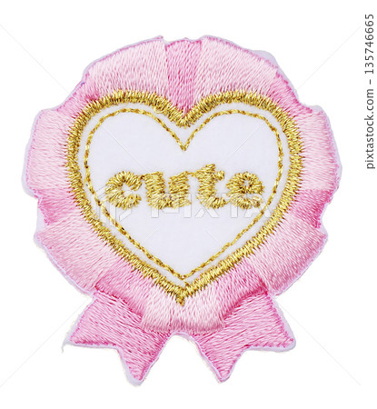 Pink heart-shaped rosette embroidery part with the word "cute" printed on it. Patch cutout material. Pink heart-shaped rosette embroidery part with the word "cute" printed on it. Patch cutout material. 135746665