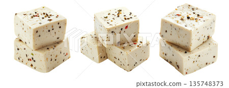 Cubes of seasoned tofu with visible herbs and spices, arranged in stack isolated on white transparent background Cubes of seasoned tofu with visible herbs and spices, arranged in stack isolated on white transparent background 135748373